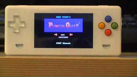 Dingoo A380  new open Source Firmware , TV-OUT and wireless Controller F16