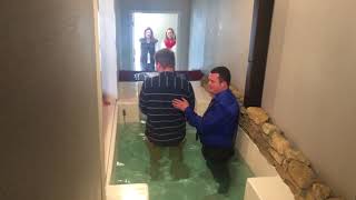 Cameron being baptized