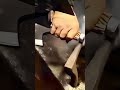 the process of making an axe and attaching a handle #shorts
