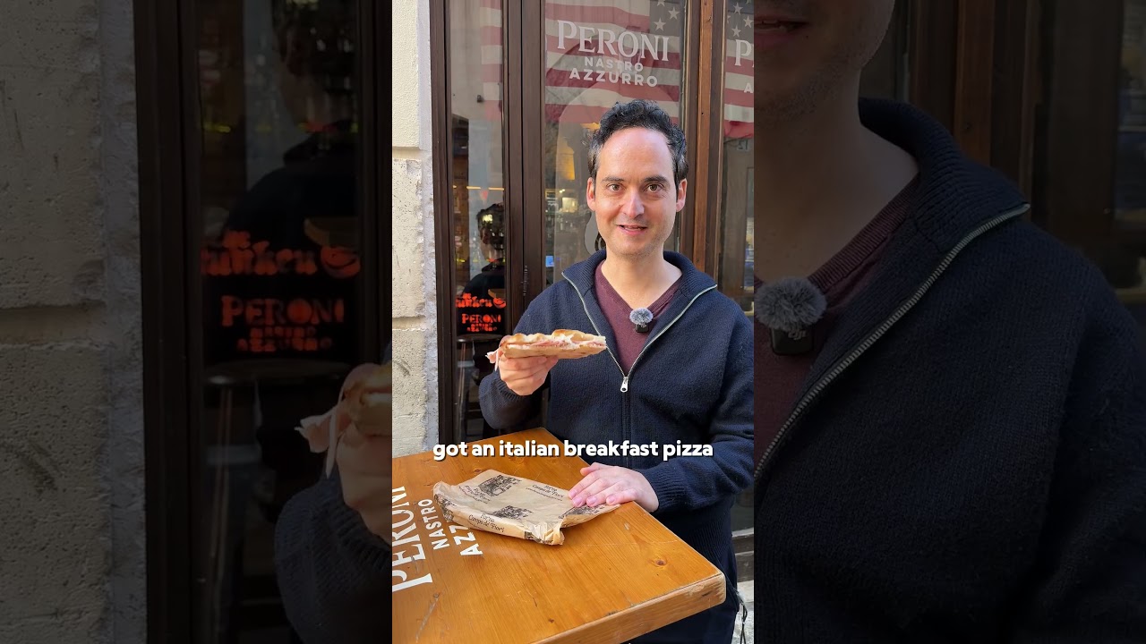 Eating Pizza for breakfast in Italy!