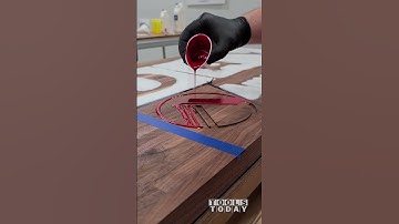 Pouring Epoxy Logo