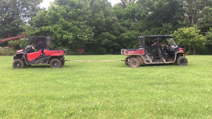 Honda pioneer vs can am defender