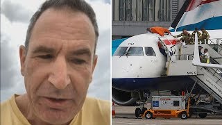 Blind Paralympian climbs onto plane in Extinction Rebellion protests at London City Airport