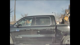 Pickup truck runs stop sign because they are late for school