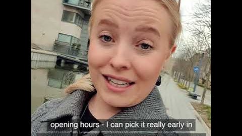 A Danish end user picking up a parcel in a Nærboks / SwipBox Infinity parcel locker.