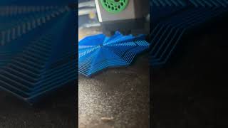 Bambu labs p1s printing an expanding star fidget.