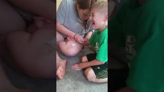 Taegan gets his spider bite popped!