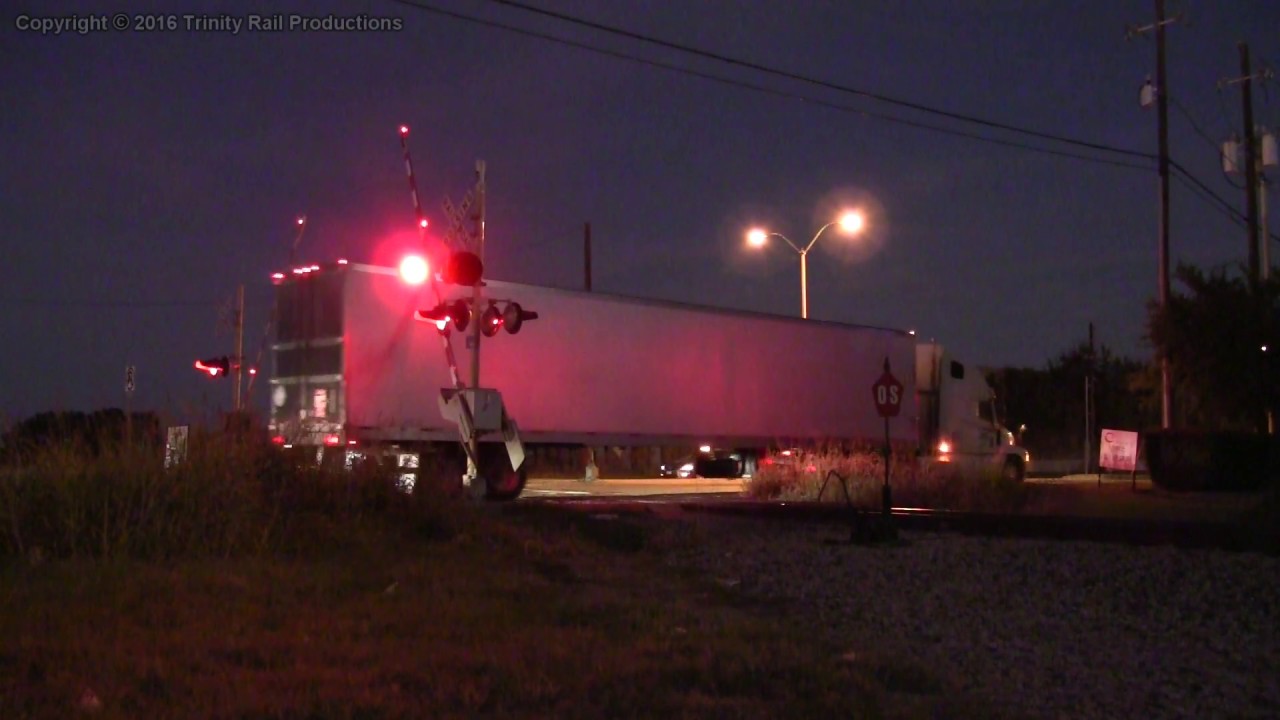 Semi truck tears off railroad crossing gate // Trinity Rail Productions