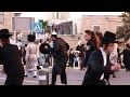 נשים בחזיות מתעמתות עם יהודים חרדים במחאה נגד האירוויזיון 