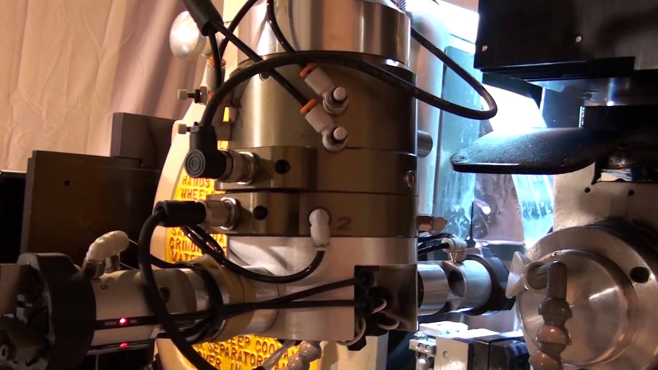 Infeed Centerless Grinding a fluid dispensing nozzle on a Royal Master