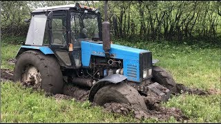Трактор Беларус по Грязи. т 16 и трактор т 40 тоже застряли