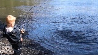 2 year old catches a salmon on his own LIKE A BOSS!