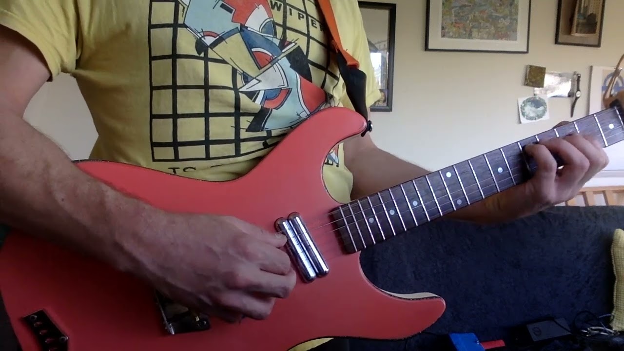 How to Play a salmon colored guitar