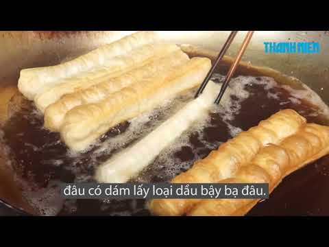 Video Hơn 40 năm tiệm quẩy nóng, bánh tiêu chợ Thiếc - youtube