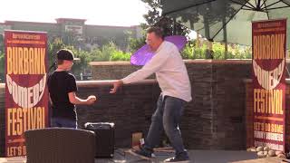 Michael Rayner Juggles Tennis Rackets and Hotel Guests