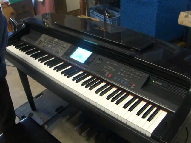 Yamaha Clavinova CVP-98 digital piano and stool in glossy black