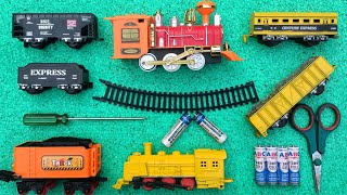 Merakit dan unboxing mainan kereta api uap,kereta api engineering,kereta rail king kuning