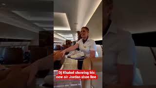 Dj Khaled showing off his new air Jordan shoe line inside his private jet