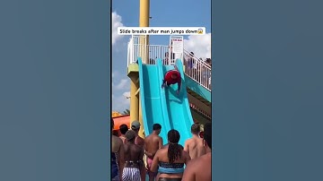 Slide breaks after man jumps down😱 #funny #fails #slides