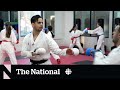 Karate Olympian fights for refugees in sport