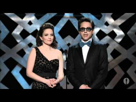 Robert Downey Jr. and Tina Fey presenting Best Ori...