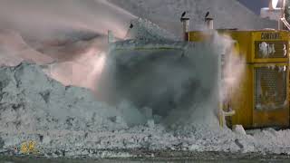 Snowplow Video 49 - Amazing snow blower throwing high atop a mountain