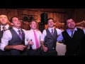 The guys sing Piano Man at Chris and Ashley's wedding.