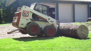 At Jeffs Sawmill loading a Monster Red Oak log #407 . sawing tomorrow