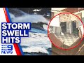 Beachfront homes battered, flood warnings as huge swell forms | 9 News Australia