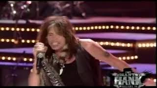 Steven tyler and buddy guy on cmt giants hank wiiliams jr. broadcast
in 2009.
