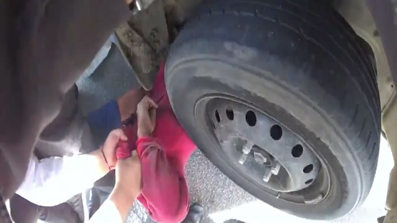 Dramatic rescue caught on camera Good Samaritans lift car off