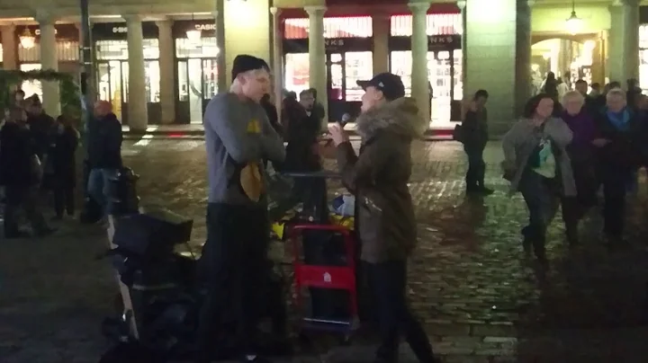 Celinde Schoenmaker duets with busker Stephen Barr...