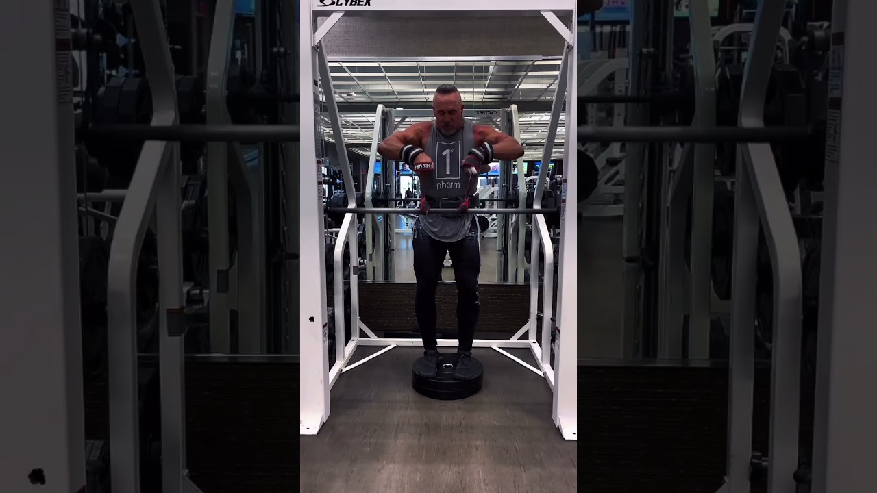 For less stress on the wrist and a more efficient hand position for your front delts and traps,
