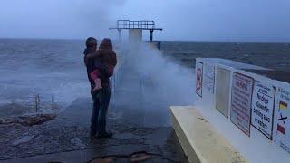 Storm watchers at Blackrock Diving tower in Galway as storm Lorenzo tracked up the west