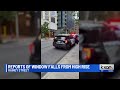 Window falls from Rainey St. high-rise apartment damaging cars