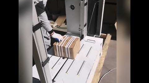 Lower table automatic strapping machine