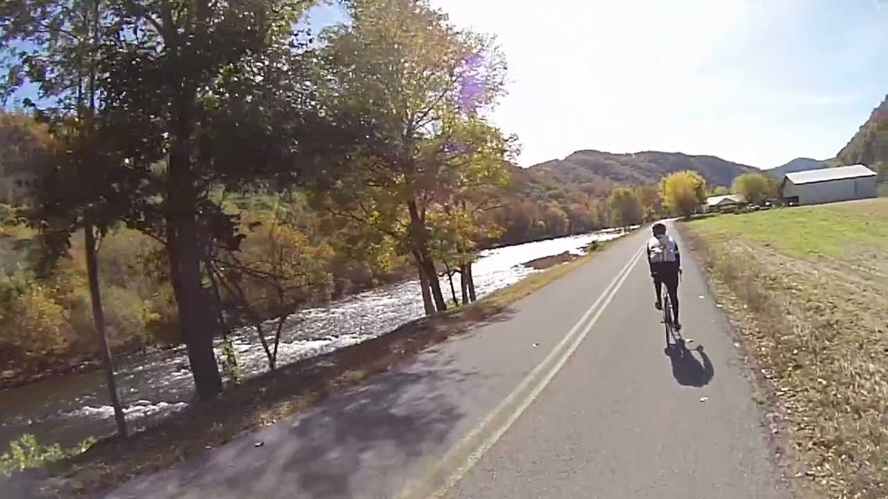 Varinka and Brian cycling along the Nolichucky