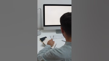 Laptop Computer on White Surface Against White Background · Free Stock Video