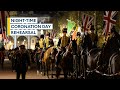 Military march through London streets in full coronation rehearsal