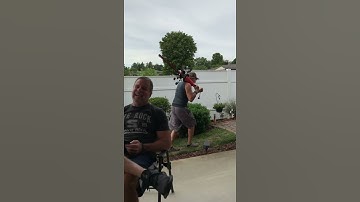 Thumbnail of Reveille Song Interrupts Veteran Grandpa’s Yard Work
