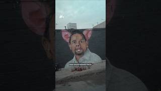 Artists arrested for satirical mural