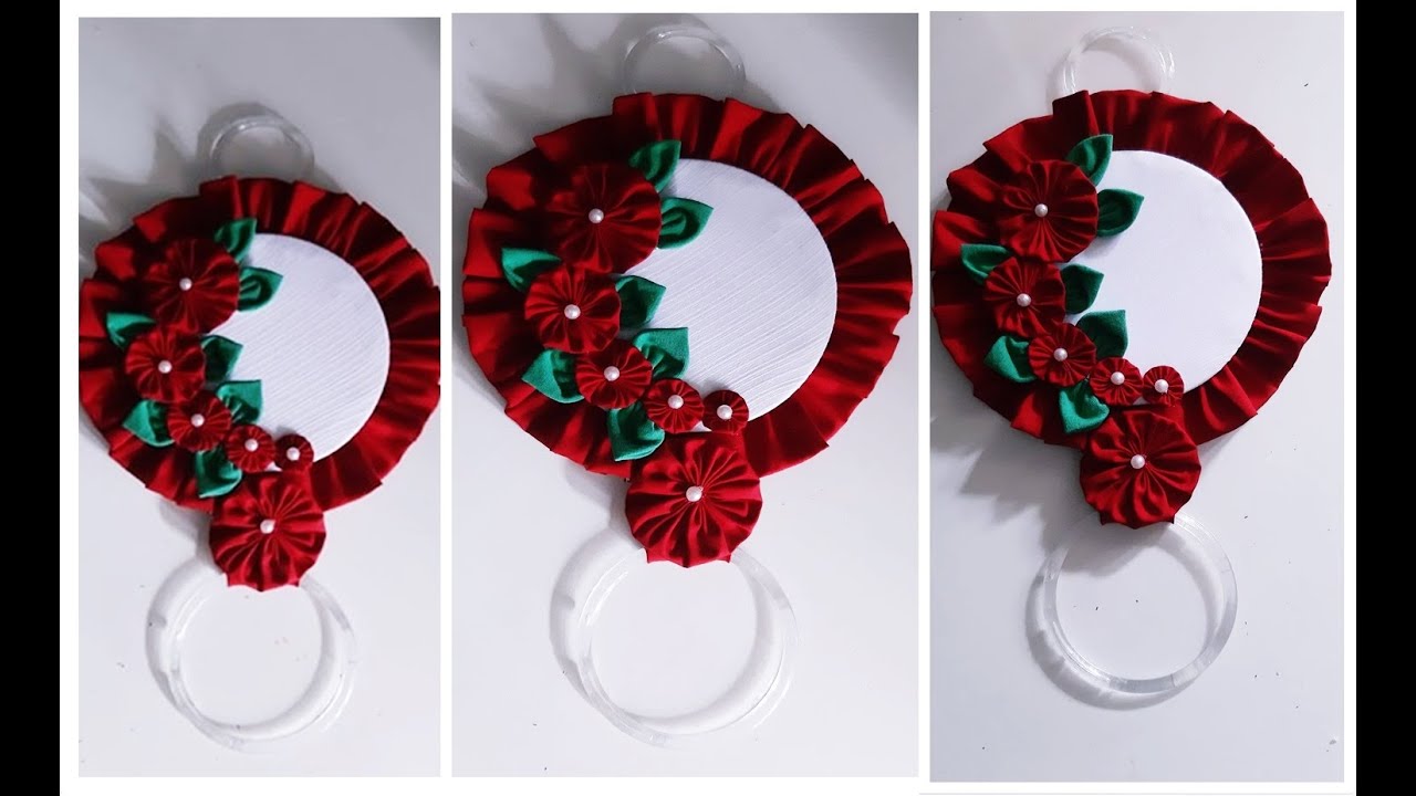 PORTA PANO  DE PRATO COM ARRANJO  DE  FUXICOS