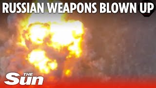 Ukrainian forces blow up Russian weapons and equipment in a massive explosion