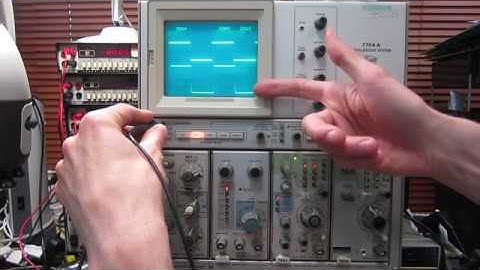 Tektronix 7704A oscilloscope mainframe with 7A26, 7A26, 7B85 and 7B80 plugins