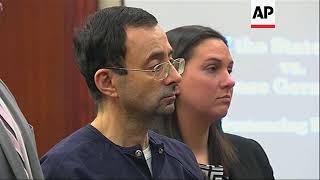 USA - Dozen more abuse survivors confront ex-gymnastics doctor / Michigan sports doctor sentenced to