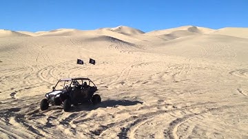 Marshall and Jason Jumping RZR XP4 in Dumont Dunes