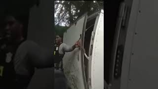 Bodycam shows officers rescuing girls from locked, 97-degree trailer
