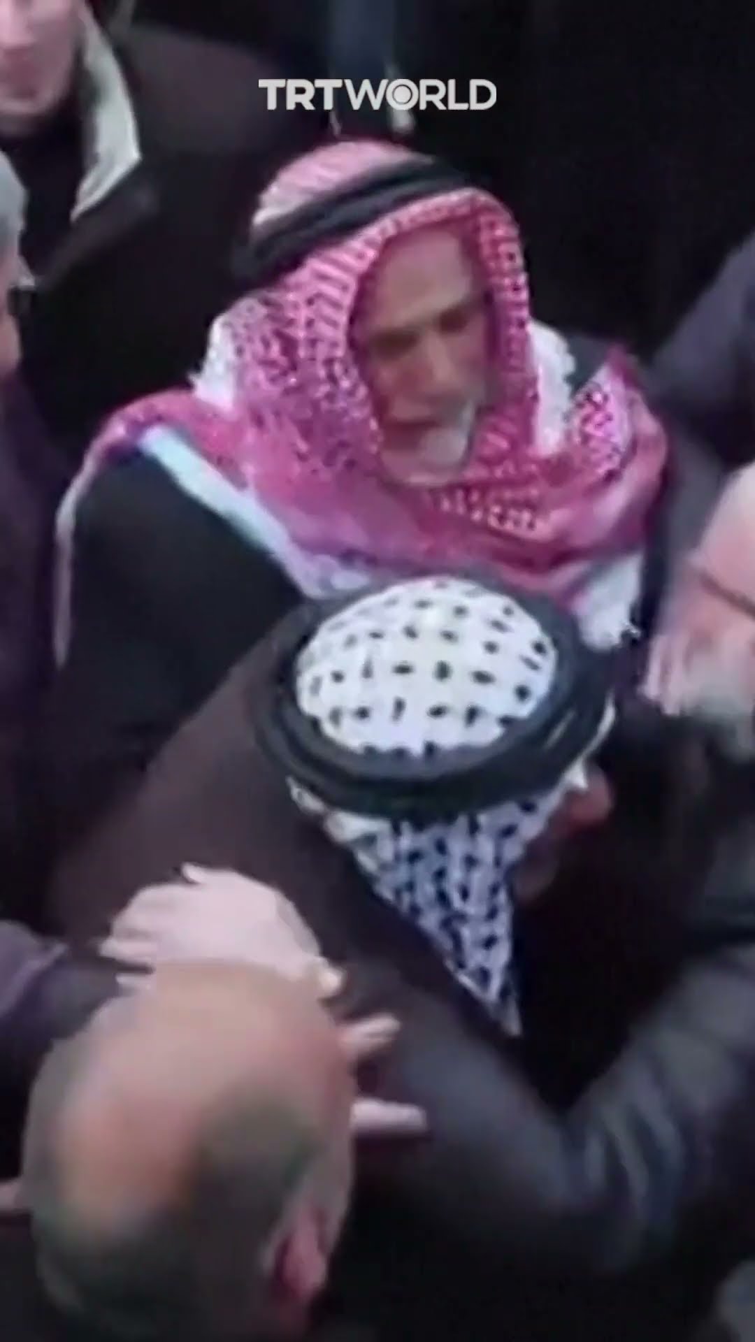 Palestinians hug released prisoners from Israeli jails
