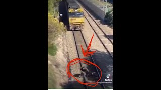 Hero! Man risks his life and saves dog from death by train!