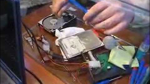 Replacing hard drive read/write heads.